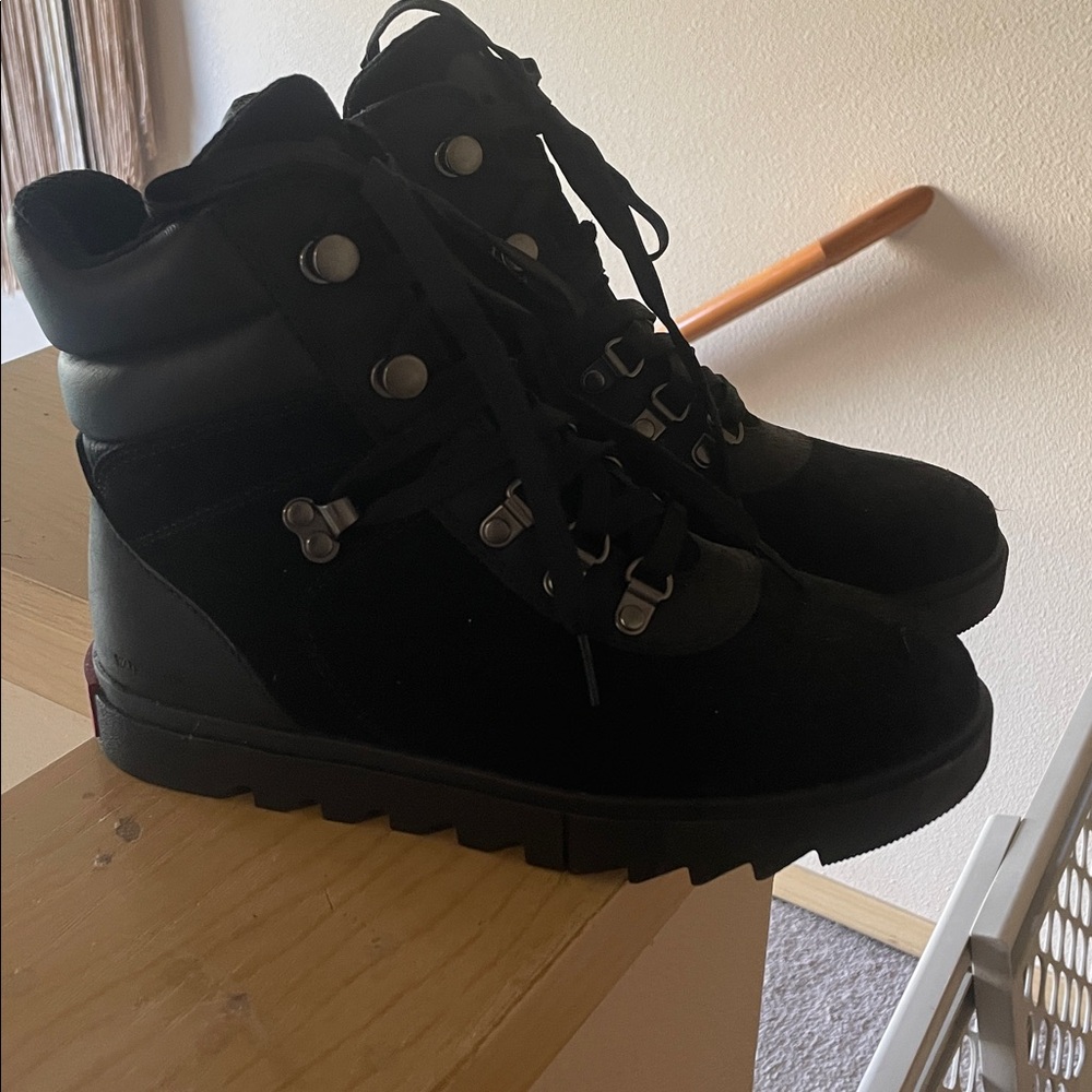 Sorel Black Lace Up Boots with Red accents on boots